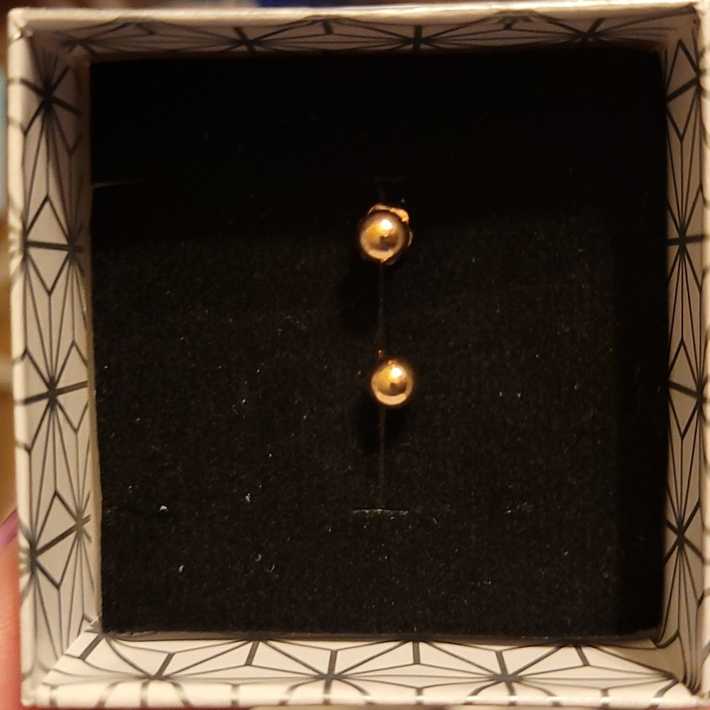 Rose gold colored earrings
